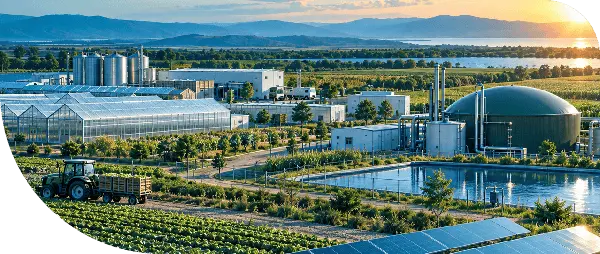 Farm with greenhouses, a biogas dome, crops, and solar panels